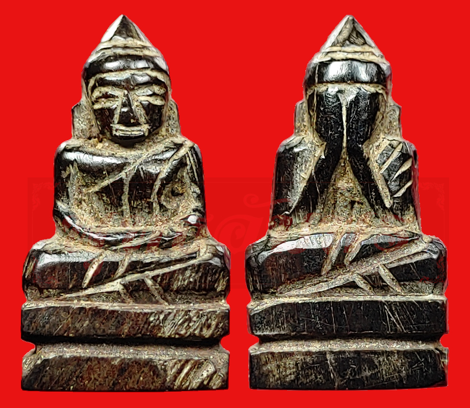 Wood carved blindfolded amulet